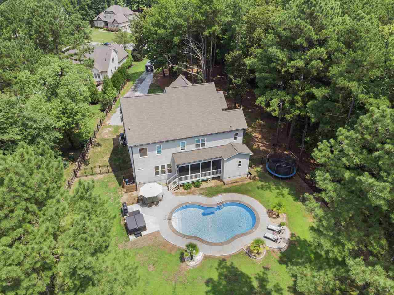 Aerial from the rear showing pool and screened porch